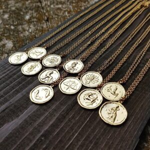 Zodiac necklace in gold plated stainless steel. Jewelry saskatoon