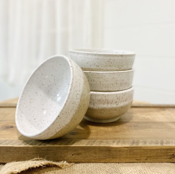 white and cream handmade pottery bowls