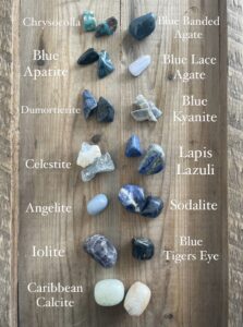 a collection of blue tumbled crystals