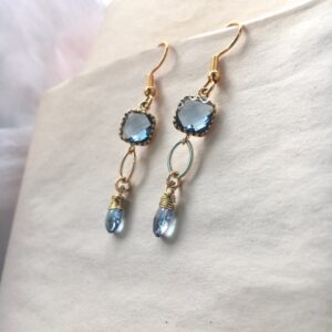 blue glass dangly earrings rogue jewelry