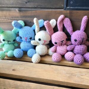 row of Colourful bunny stuffed animals