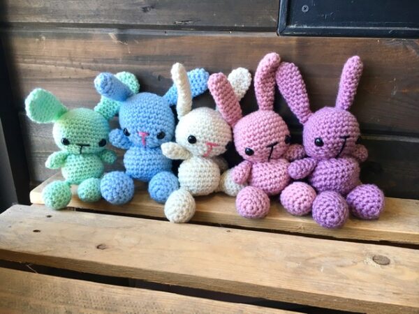 row of Colourful bunny stuffed animals
