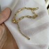 paperclip chain bracelets in gold