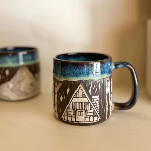 engraved Mountain Cabin pottery mug