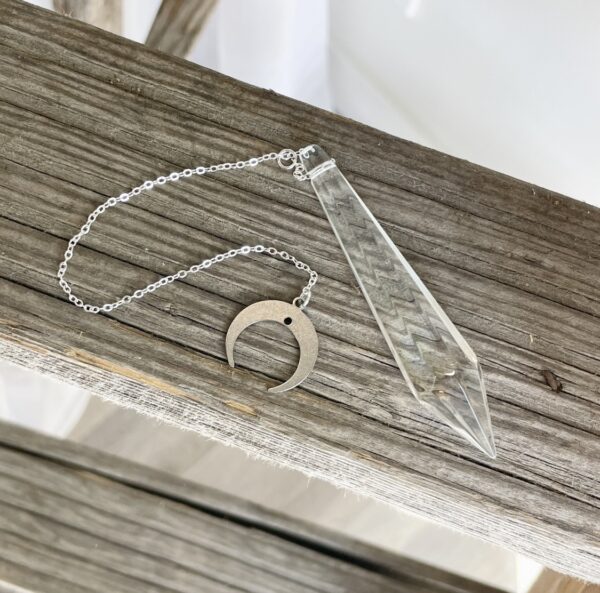 glass pendulum with half moon charm silver chain