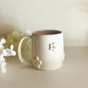 Pottery Mug with 3D Flower detail featuring a gold center.